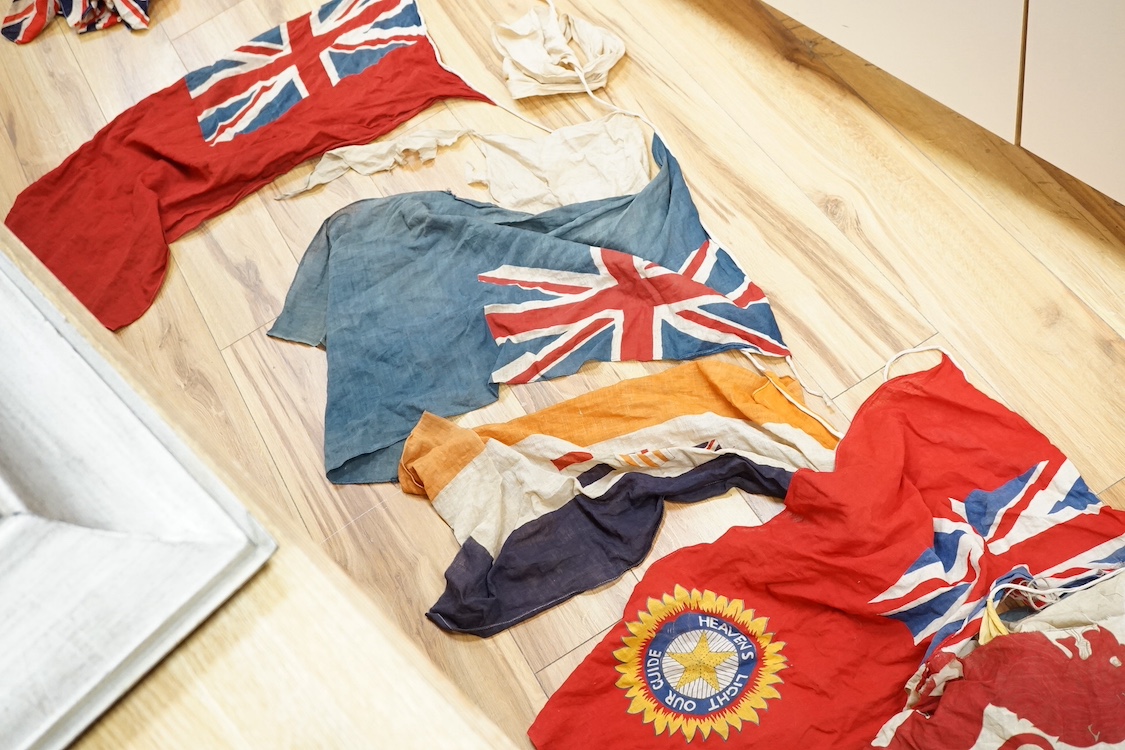 Two early 20th century strands of British patriotic bunting, one comprising 17 flags including the union flag, the British Empire South African flag, Canada flag (1892-1965), Australian Red Ensign, etc., together with a